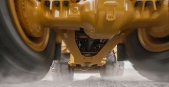 Underside view of Volvo L150-L260 wheel loader showing axles