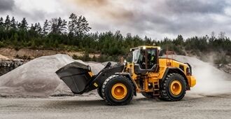 Volvo L220 wheel loader travelling through construction site