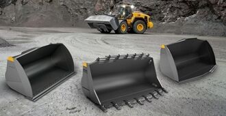 Three large buckets in front of L260 Volvo wheel loader that can be used in quarrying