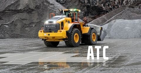 Volvo L260 wheel loader in a quarry with 'ATC’ graphic next to it showing automatic traction control